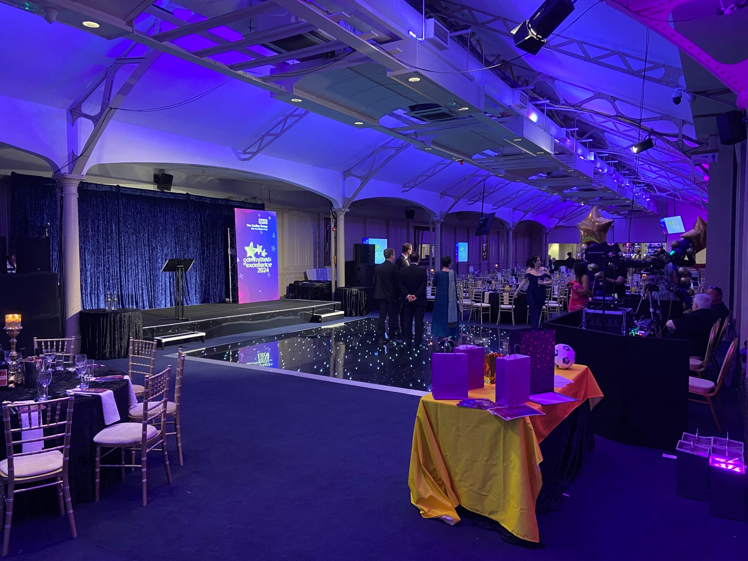 awards evening with stage setup for live camera relay