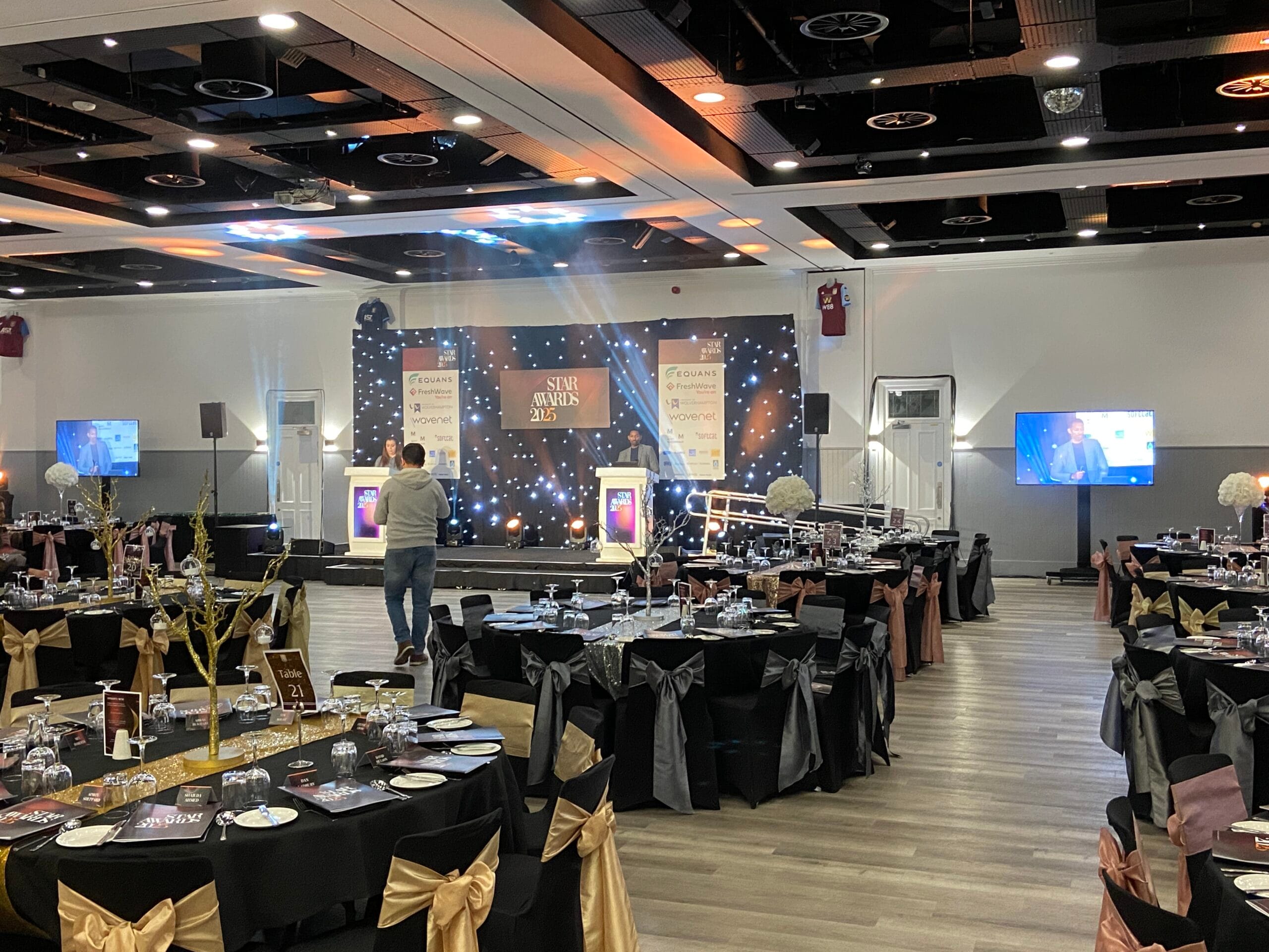 awards evening with stage setup for live camera relay